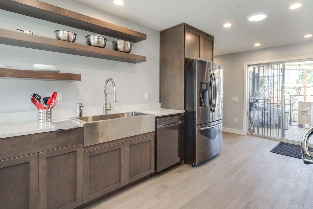 kitchen remodel with open shelving above the countertops