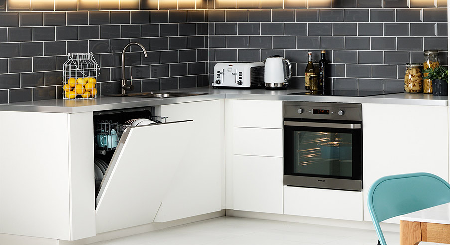 kitchen with appliances integrated into kitchen cabinet design