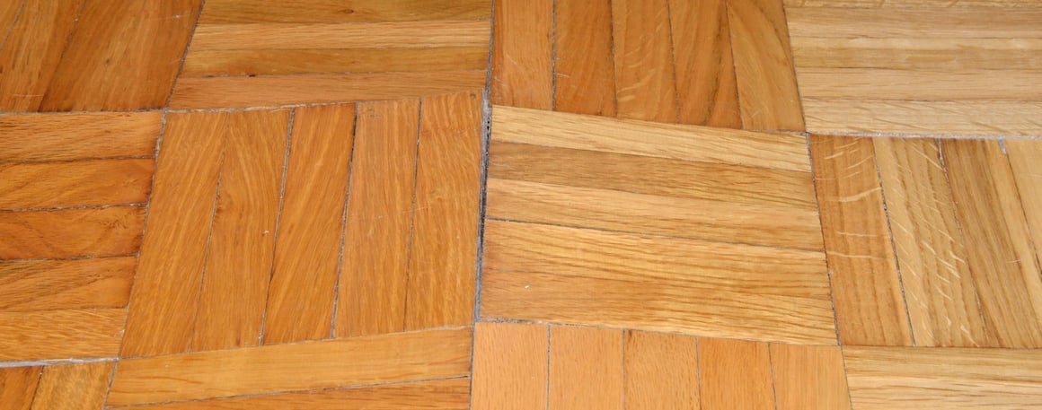 Water-damaged wooden parquet flooring